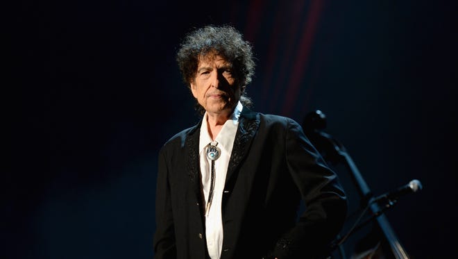 Honoree Bob Dylan speaks onstage at the 25th anniversary MusiCares 2015 Person Of The Year Gala honoring Bob Dylan at the Los Angeles Convention Center on February 6, 2015 in Los Angeles, California. The annual benefit raises critical funds for MusiCares' Emergency Financial Assistance and Addiction Recovery programs. For more information visit musicares.org.  (Photo by Michael Kovac/WireImage) ORG XMIT: 535088427 ORIG FILE ID: 462898048