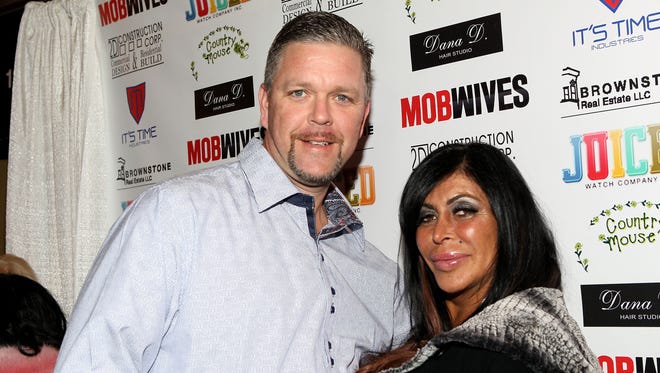Big Ang is seen in January 2013 with her husband, Neil Murphy, from whom she became estranged. But she didn't get her mob ties from him; instead, they came from her  uncle, the late Salvatore "Sally Dogs" Lombardi, a reputed captain of the Genovese crime family.
