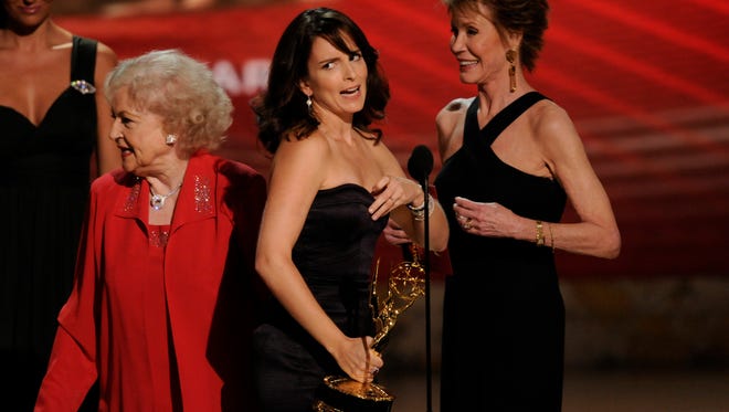 Moore and White also teamed up on the Emmy stage in 2008 to present Tina Fey with an award.