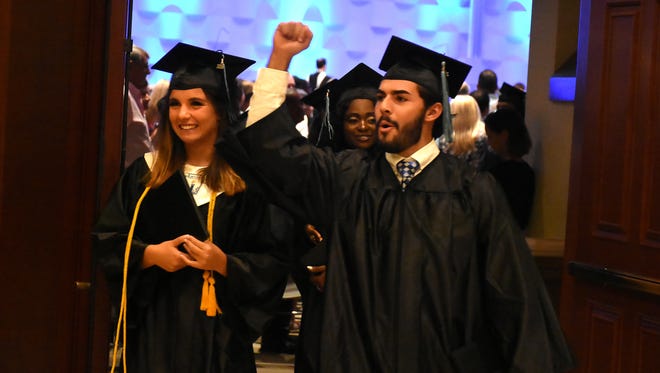 Graduates exult after their recessional. Marco Island Academy graduated its 2018 senior class Friday evening in a ceremony at the Family Church.
