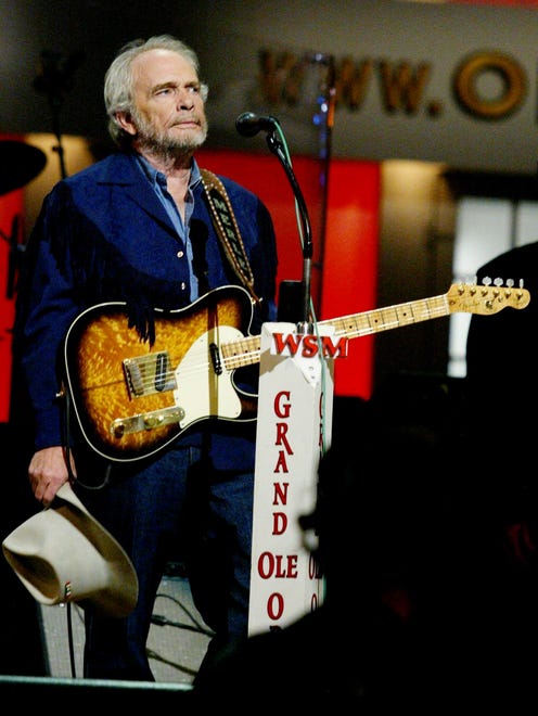 Merle Haggard is moved by the cheering crowd after he finished a song during the "Grand Ole Opry" on Sept. 27, 2003.