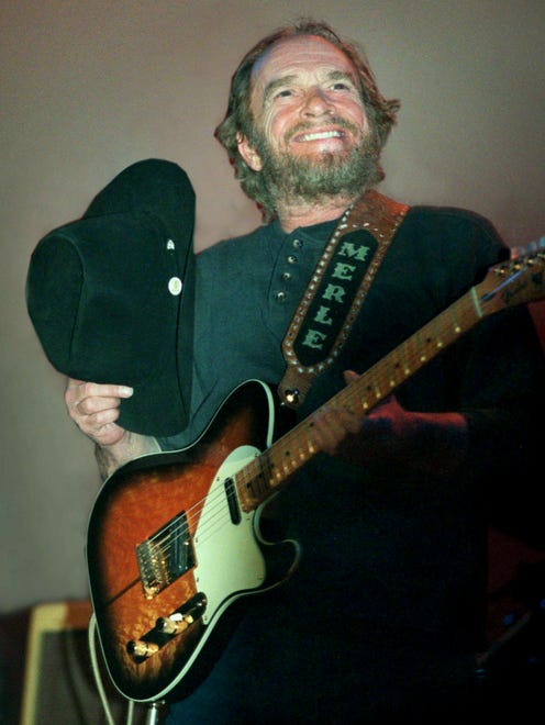 Merle Haggard takes his hat off to the crowd during his concert at the Ryman Auditorium on May 3, 2000.