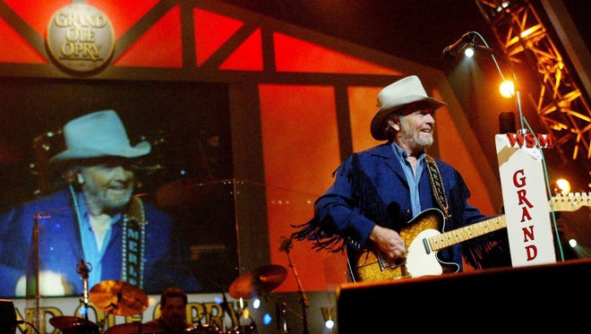 Merle Haggard performs for the crowd during the "Grand Ole Opry" on Sept. 27, 2003.