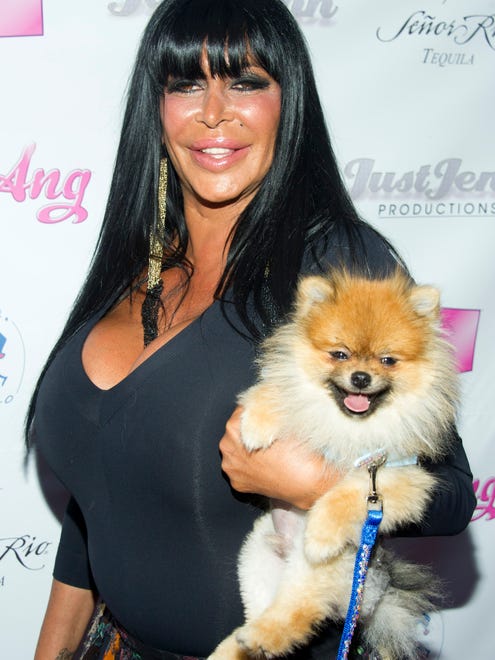 Little Louie, a Pomeranian, often accompanied Big Ang to events.