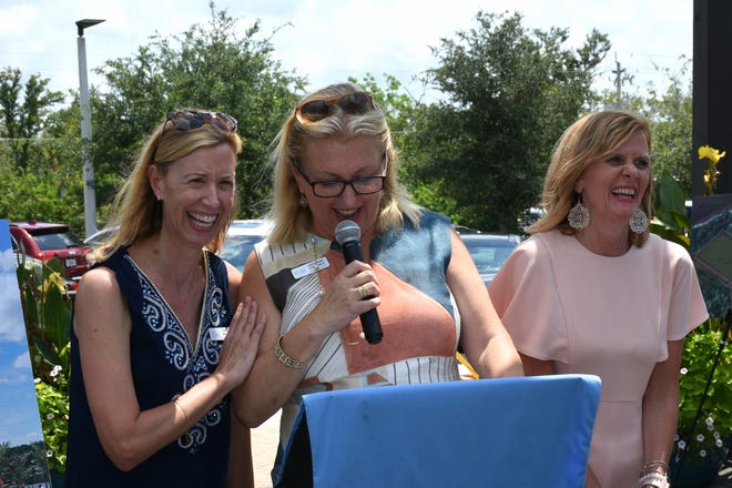 Marianne Iordanou, co-chair of the school's capital campaign, speaks flanked by founder Jane Watt and principal Melissa Scott. Marco Island Academy, the island's charter high school, broke ground for phase one of their permanent campus Monday morning, and announced progress in their overall fundraising campaign.