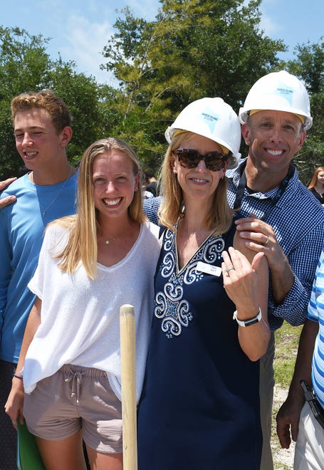 Jim and Jane Watt, from right, with children Olivia and Jonathan. Marco Island Academy, the island's charter high school, broke ground for phase one of their permanent campus Monday morning, and announced progress in their overall fundraising campaign.