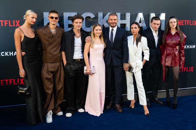 Happy birthday, Victoria Beckham! The British Spice Girl-turned-designer is entering a new decade, turning 50 on April 17, 2024. To celebrate, we've rounded up some of the fashion designer's most memorable look, starting with the London premiere of the Netflix documentary "Beckham" was a family affair! On Oct. 3, 2023, Victoria and David Beckham were joined by Mia Regan (left), Romeo Beckham, Cruz Beckham, Harper Beckham, Brooklyn Beckham and Nicola Peltz.