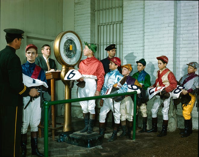 Jockey's weighing in on Kentucky Derby day at Churchill Downs in May 1940.