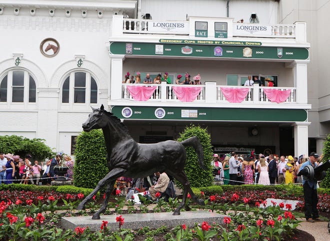 2019 view of the statue of the first Kentucky Derby winner Aristides before the 145th running of the Kentucky Oaks at Churchill Downs. Aristides, with Oliver Lewis aboard, won the first Kentucky Derby in 1875 at the new Louisville Jockey Club, covering the 1 1/2- mile course in 2:37 3/4 to defeat 14 competitors. The track, later called Churchill Downs, is a creation of Meriwether Lewis Clark, a grandson of explorer William Clark of the Lewis & Clark Expedition. A crowd of 10,000 watches the first Derby, which now draws more than 100,000 people each year.