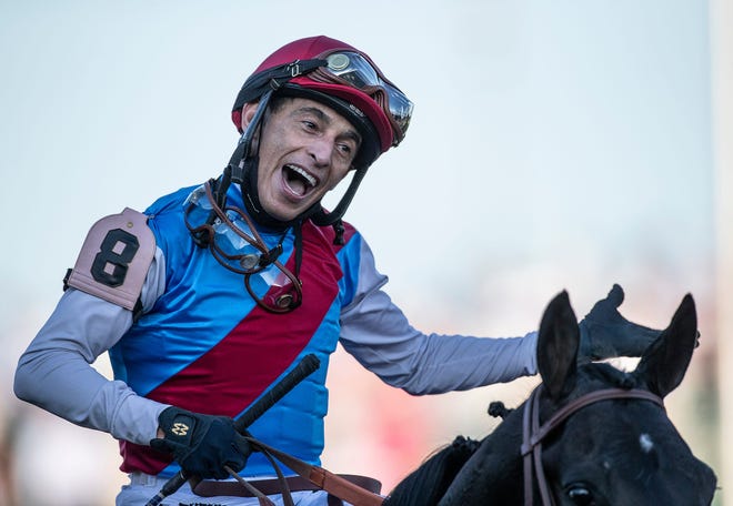 Jockey John Valazquez was all smiles as he leads 2021 Kentucky Derby winner Medina Spirit into the winners circle after the race. Medina Spirit, trained by Bob Baffert, is his seventh Kentucky Derby winner. Medina Spirit, trained by Bob Baffert, was disqualified as the winner of the Kentucky Derby 2021 and Mandaloun, trained by Brad Cox, was declared the winner.