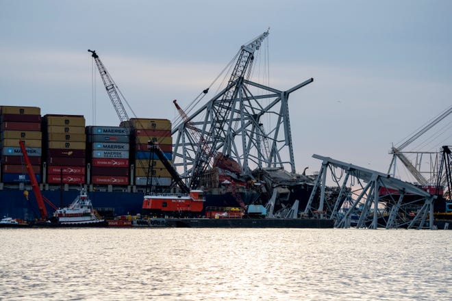 Salvage work continues on the Francis Scott Key Bridge on May 9, 2024. The major span over the Patapsco River in Baltimore collapsed on March 26, 2024 after it was struck by a Singapore-flagged container ship 'Dali’, killing six road workers who were on the bridge at the time.