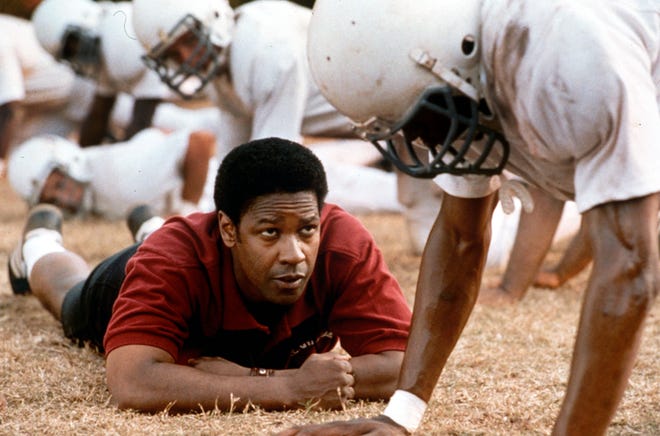 11. " Remember the Titans " (2000): Coach Herman Boone (Denzel Washington) integrates a high school football team in Virginia.