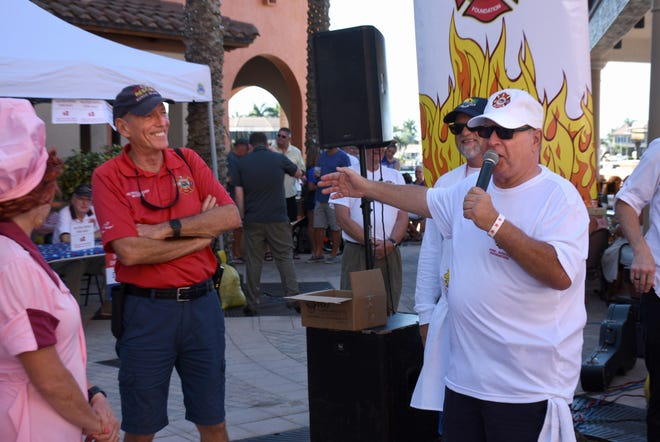 Emcee Steve Reynolds recognizes Fire-Rescue Chief Mike Murphy. The Marco Island Fire-Rescue Foundation held their sixth annal Jerry Adams Chili Cookoff Saturday at the Esplanade, raising funds to help fire department families impacted by Hurricane Michael.