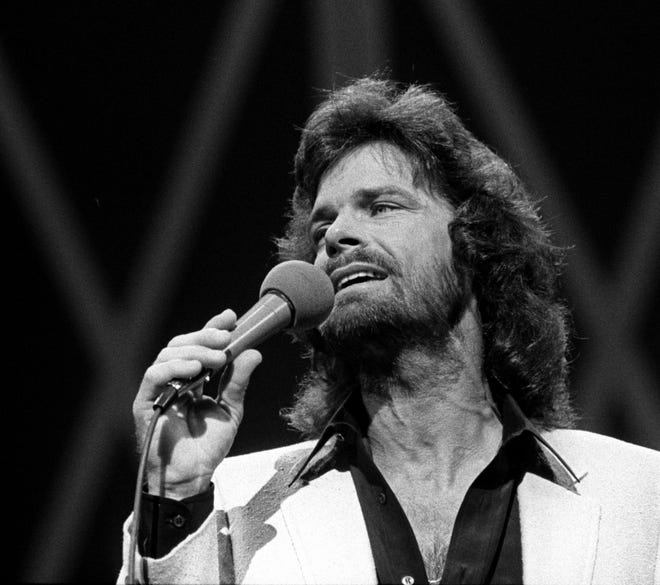 B.J. Thomas makes his debut as the newest member of the Grand Ole Opry on Aug. 7, 1981. He was introduced by country humorist Jerry Clower. P