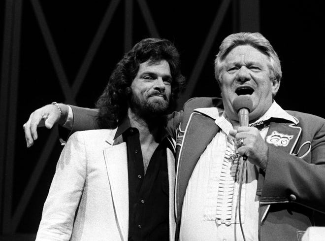 B.J. Thomas and Jerry Clower 1---B.J. Thomas makes his debut as the newest member of the Grand Ole Opry on Aug. 7, 1981. He was introduced by country humorist Jerry Clower.