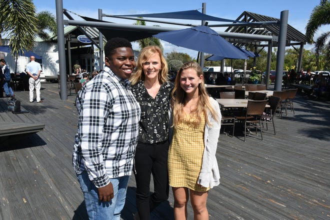 Principal Melissa Scott with students Teagan Havemeier and Evans Metelus, left. Marco Island Academy is embarking on a capital campaign to raise millions of dollars and give the school a permanent home, after years of operating in prefab modules.