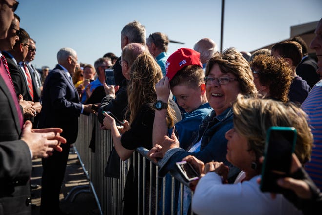 Vice President Mike Pence greets friends and family who awaited his arrival at the Naples Airport via Air Force Two on Thursday, March 28, 2019.