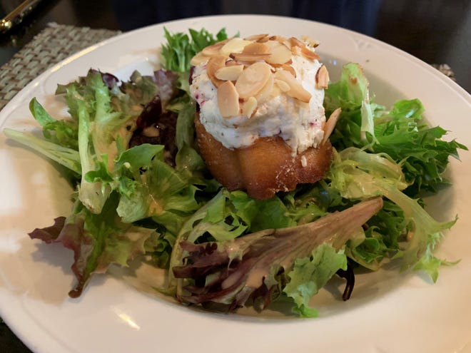 The warm almond-crusted goat cheese salad from Marek's, Marco Island.