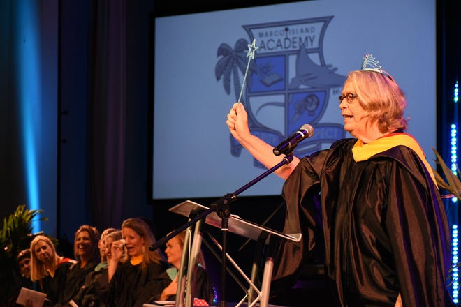 Retiring math teacher Dorothy Chapman invokes a blessing on the graduates. Marco Island Academy held its 2019 commencement ceremony Friday evening at the Family Church.