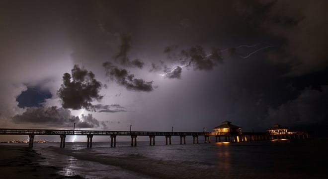 Lightning strikes in the Gulf of Mexico near the Fort Myers Beach pier on Monday, August 26, 2019. Recent storms have created light shows throughout Southwest Florida.