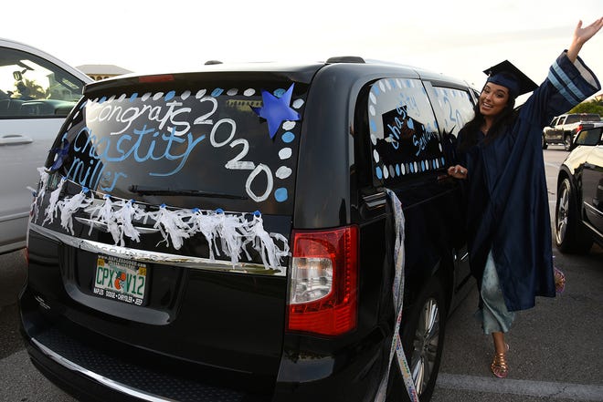 Graduate Chastity MIller brought her entire family including Angelina the dog to her commencement. Marco Island Academy, Marco Island's charter high school, held a "drive-in" graduation ceremony for their 47 graduating seniors Friday evening in the parking lot at Veterans' Community Park.