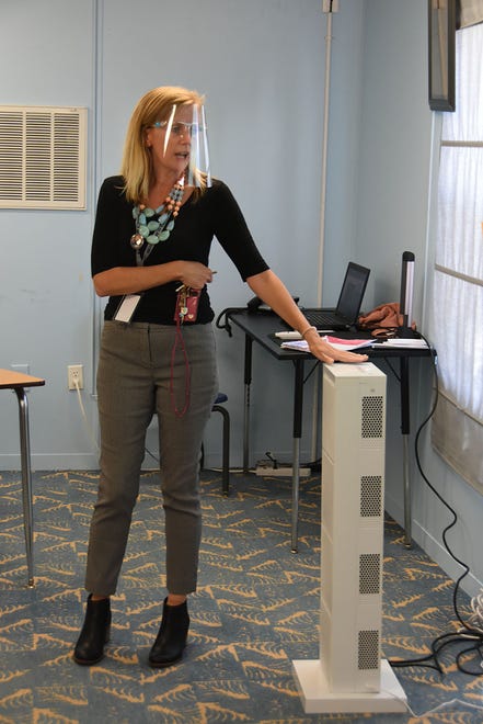 MIA principal Melissa Scott, with one of the HEPA filters that are in each classroom at the school. Marco Island Academy, the island's charter high school, opened its doors to students on Wednesday, August 12.