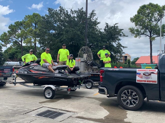 Marco Patriots prepare for rescue operations on Aug. 25, 2020, in Baton Rouge, LA, before the landfall of Hurricane Laura. From left to right: Cameron Donahue, Patriots co-founder Matt Melican, boat captain Ron Hagerman, Naples business owner Dana Coote and retired-Marines Lore "Robin" Lee and Allan Garry.