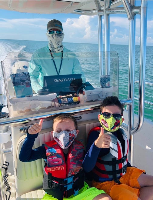 Capt. Carlos Escarra takes young boaters out shelling. Marco Islanders employ various methods to get recreation during the pandemic, and a lot of them involve enjoying the natural beauty all around.