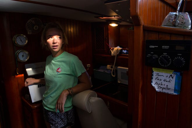 Sascha Meyers talks about her ship's The Far Side, navigation and communication system during a tour, Thursday, Dec. 24, 2020, at their home in Marco Island.