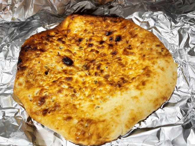 Peshwari dry fruit and nut naan from 21 Spices by Chef Asif, East Naples.