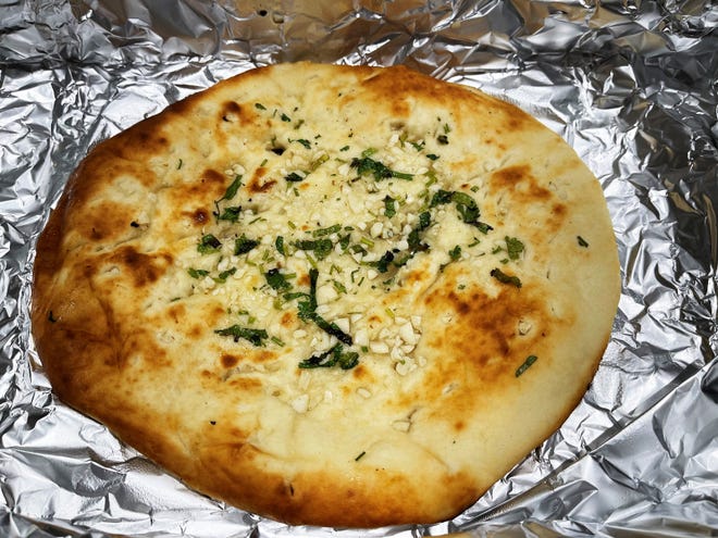 Garlic naan from 21 Spices by Chef Asif, East Naples.
