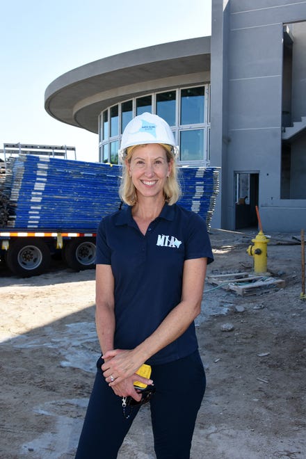 Marco Island Academy founder and board chair Jane Watt shows off construction progress at the new campus on San Marco Blvd.