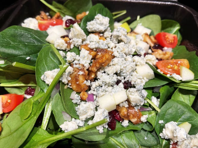 A spinach salad from Verdi’s American Bistro, Marco Island.