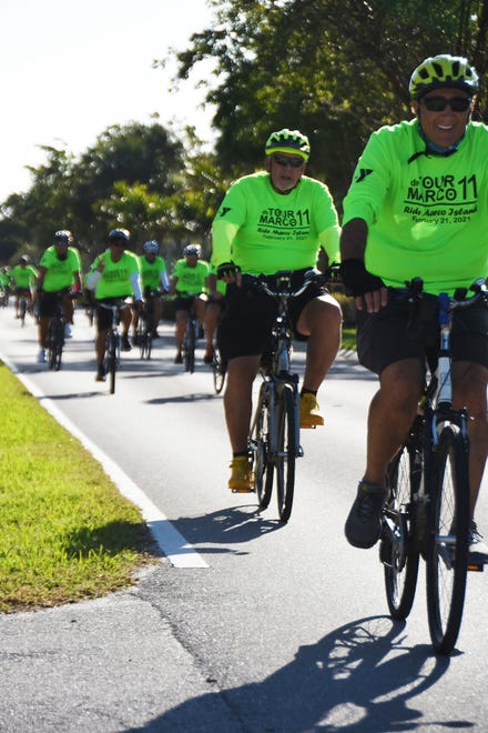 Riders including George Abounader, right, loop around the south tip of Marco by Caxambas Pass. The 11th Tour de Marco saw hundreds of cyclists riding 15 or 30 miles around the island on Sunday morning to benefit the YMCA.