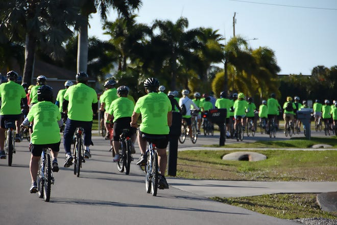 The 15-mile group heads out. The 11th Tour de Marco saw hundreds of cyclists riding 15 or 30 miles around the island on Sunday morning to benefit the YMCA.