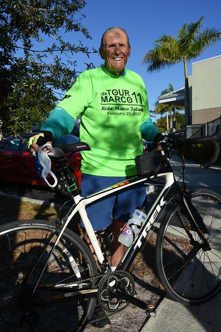 YMCA board member Chuck Thomas, 87, with his $3,000 carbon fiber bike, is also a triathlete. The 11th Tour de Marco saw hundreds of cyclists riding 15 or 30 miles around the island on Sunday morning to benefit the YMCA.