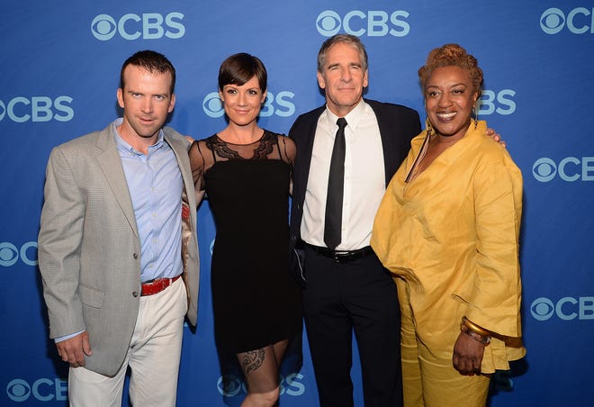 The cast of "NCIS: New Orleans," from left, Lucas Black, Zoe McLellan, Scott Bakula and CCH Pounder pose together at the CBS Network Upfront presentation at Lincoln Center on Wednesday, May 14, 2014, in New York. (Photo by Evan Agostini/Invision/AP)
