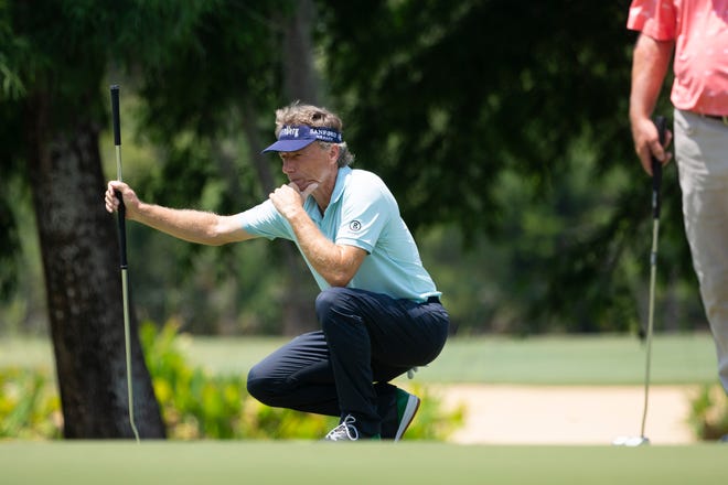 Bernhard Langer plans out a putt during day two of the Chubb Classic at Tiburón Golf Club in North Naples on Saturday, April 17, 2021.
