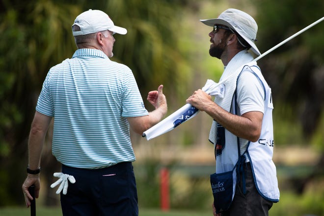 Craig Bowden, left, talks to his caddie, actor Lucas Black, right, during day two of the Chubb Classic at Tiburón Golf Club in North Naples on Saturday, April 17, 2021.