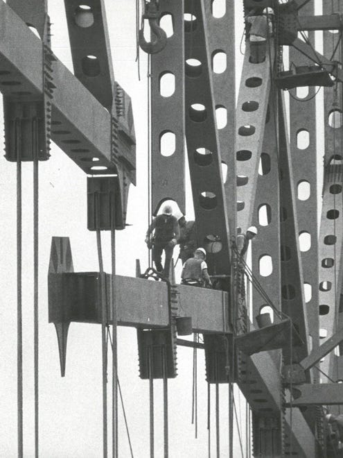 May 3, 1967: The final support that will connect the imposing superstructures of the Hart Bridge is raised to position.
