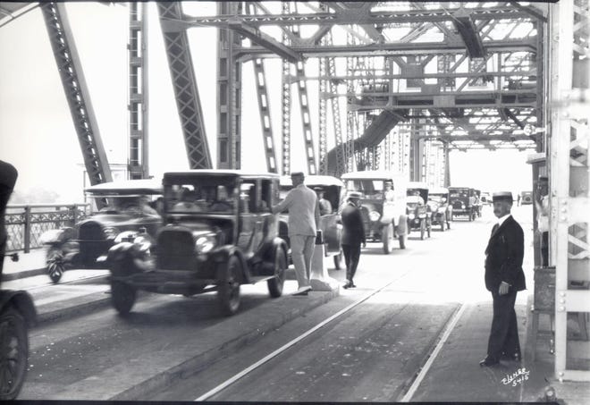 July 1, 1921: Motorists and residents celebrate the opening of the St. Johns River Bridge (later renamed Acosta Bridge).