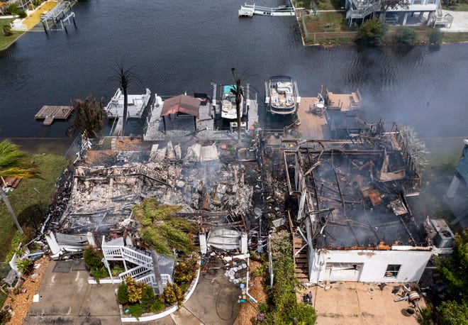 Two homes were destroyed by fire during Hurricane Idalia in Hudson, Florida on Aug. 30, 2023